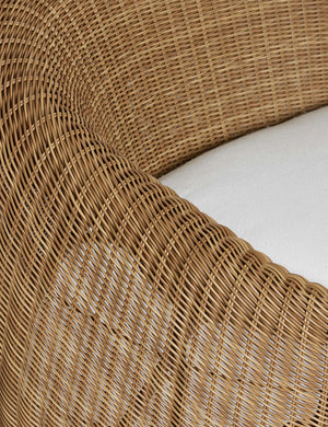 Close up of the Marisol sculptural wicker outdoor accent chair.