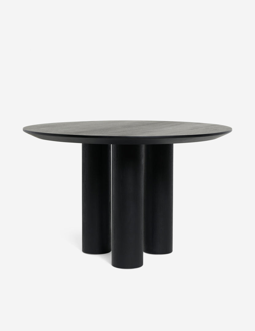 #color::black | Mojave round dining table in black.