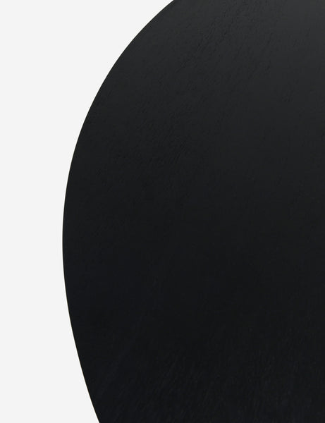 #color::black | Top of the Mojave round minimalist dining table in black.