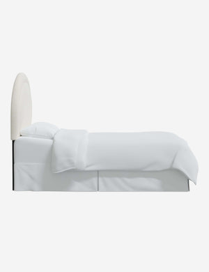 Side of the Odele Cream Sherpa arched headboard