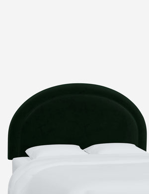 Angled view of the Odele Emerald Green Velvet arched headboard