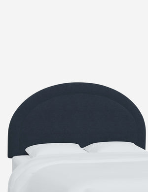 Angled view of the Odele Navy Linen arched headboard