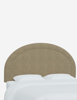 Angled view of the Odele Pebble Gray Linen arched headboard
