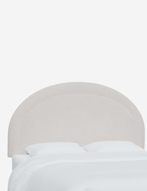 Angled view of the Odele Snow White Velvet arched headboard
