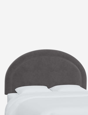 Angled view of the Odele Steel Gray Velvet arched headboard