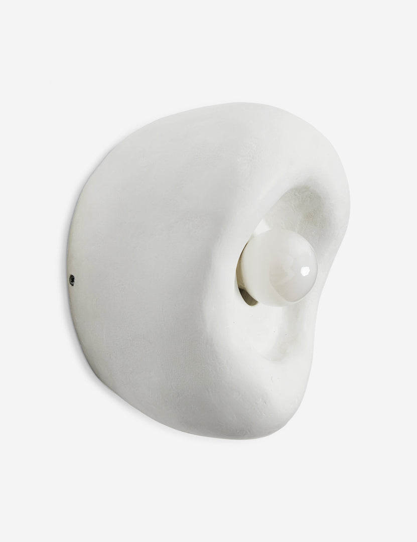 #color::white #size::single | Side view of the Odette round matte white sculptural wall sconce