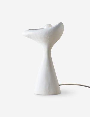 Side view of the Odette matte white sculptural table lamp