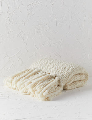 Olema ivory handwoven throw with fringed ends
