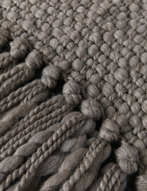 Close-up of the fringed ends on the Olema mink gray handwoven throw