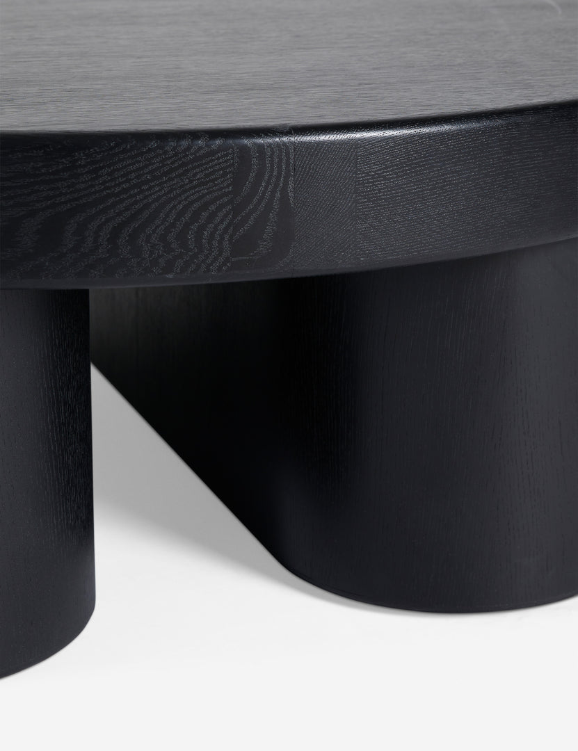 | Close up view of Olga round modern black oak coffee table