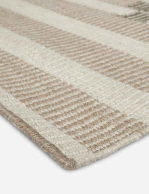 Close up of the Orion handwoven neutral striped outdoor rug by Sarah Sherman Samuel.