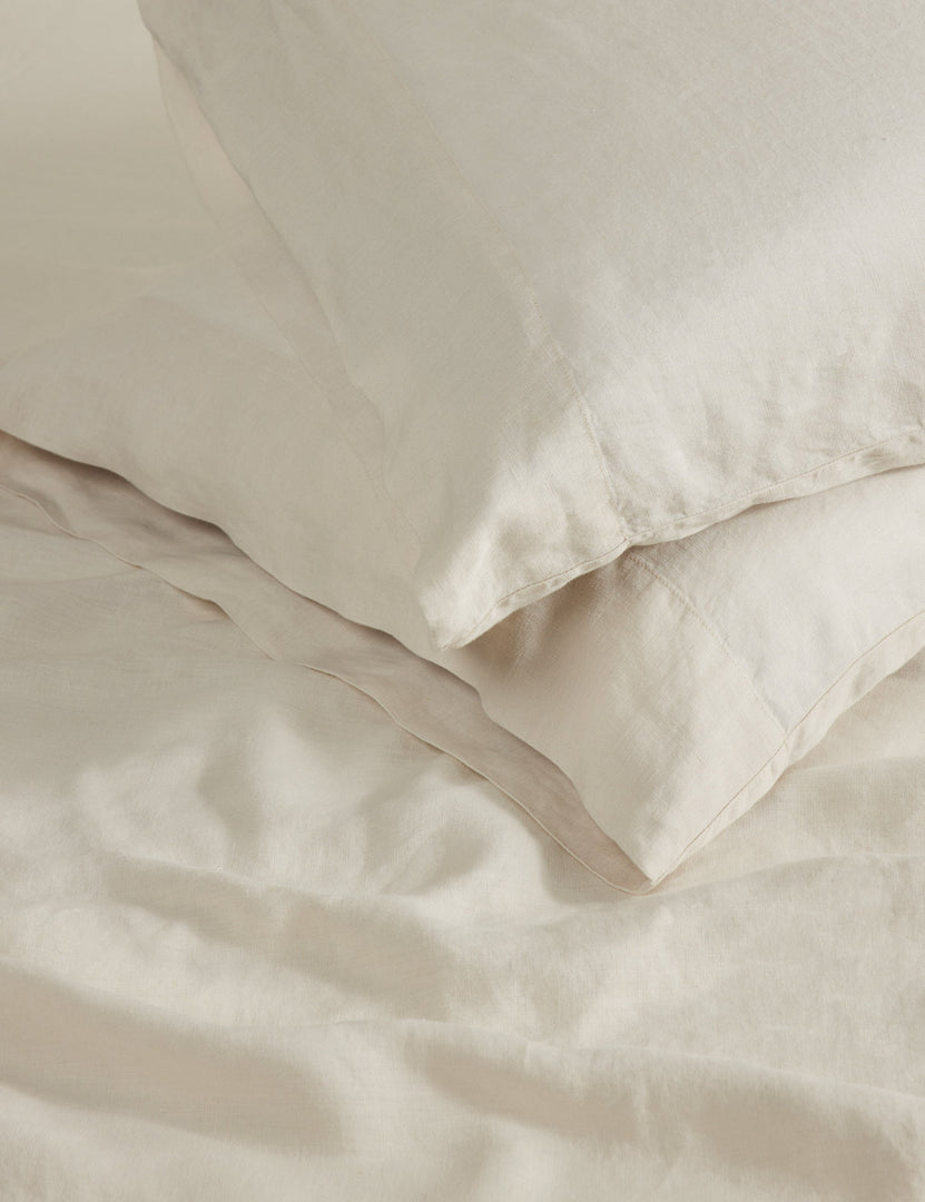 #color::cream #size::standard #size::king | Close up view of the Essie soft, breathable hemp pillowcase