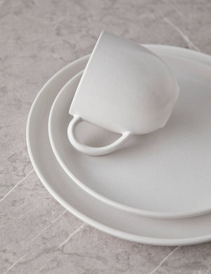 Angled view of the Pacifica salt white Dinnerware 5-Piece Place Setting by Casafina