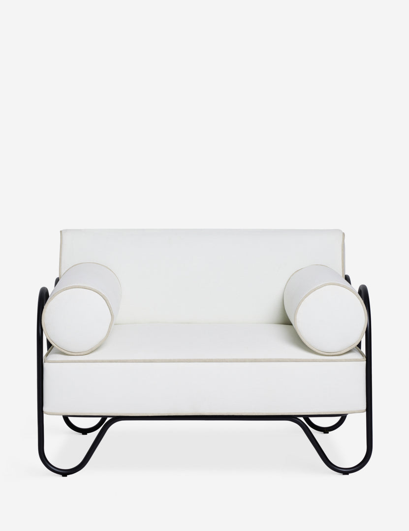 #color::ivory | Peggy sculptural iron frame and white cushion outdoor accent chair.