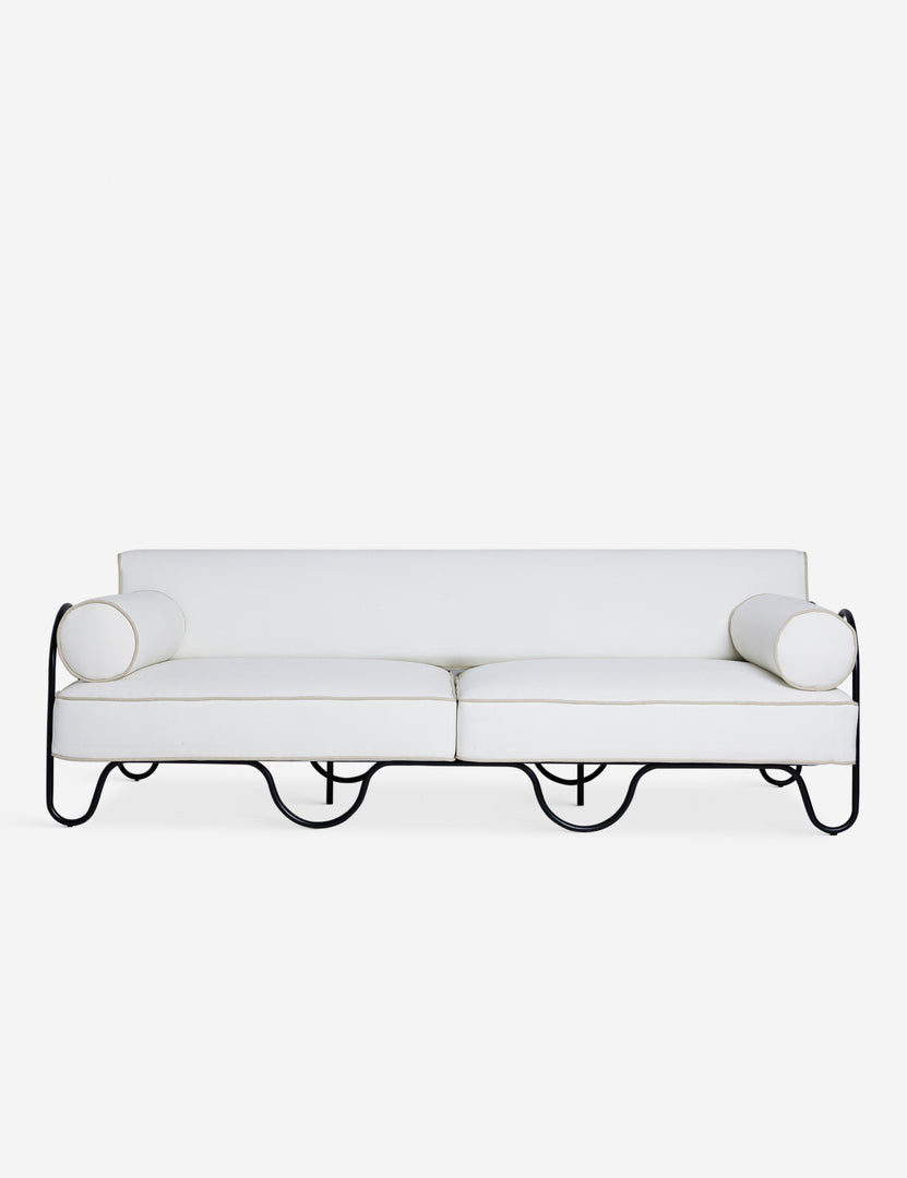 #color::ivory | Peggy sculptural iron frame and white cushion outdoor sofa.