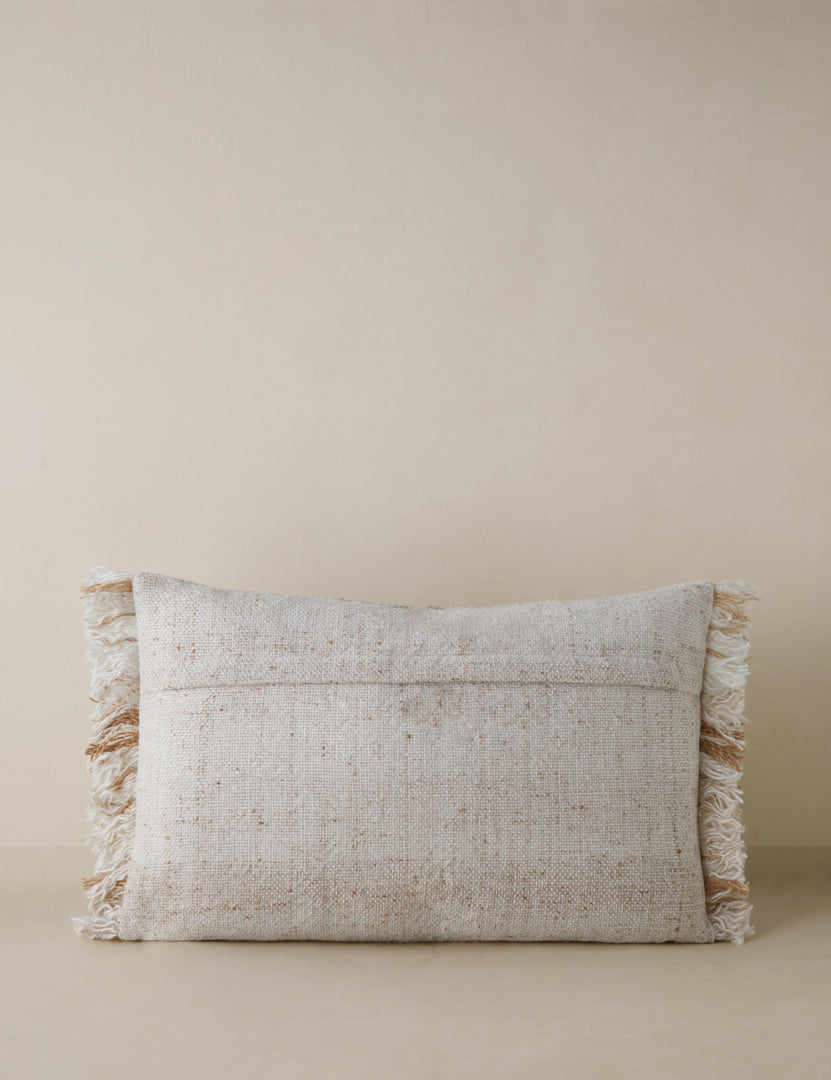 #style::lumbar | Back of the Priya plaid fringed outdoor lumbar pillow.