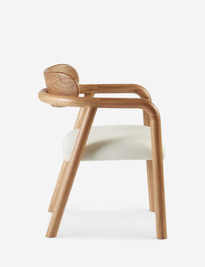 Side view of the Elvia sculptural white cedar dining chair.