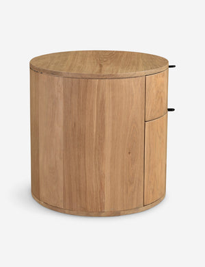 Side view of the Kono 2-drawer round oak nightstand.