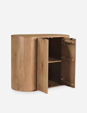 Kono 2-door curved oak cabinet with the doors open