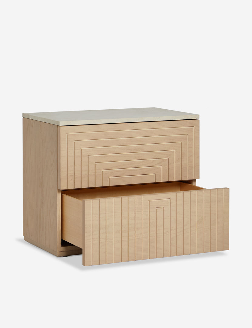 #color::natural-oak | Rayner carved linear detailing oak two drawer nightstand with bottom drawer open.