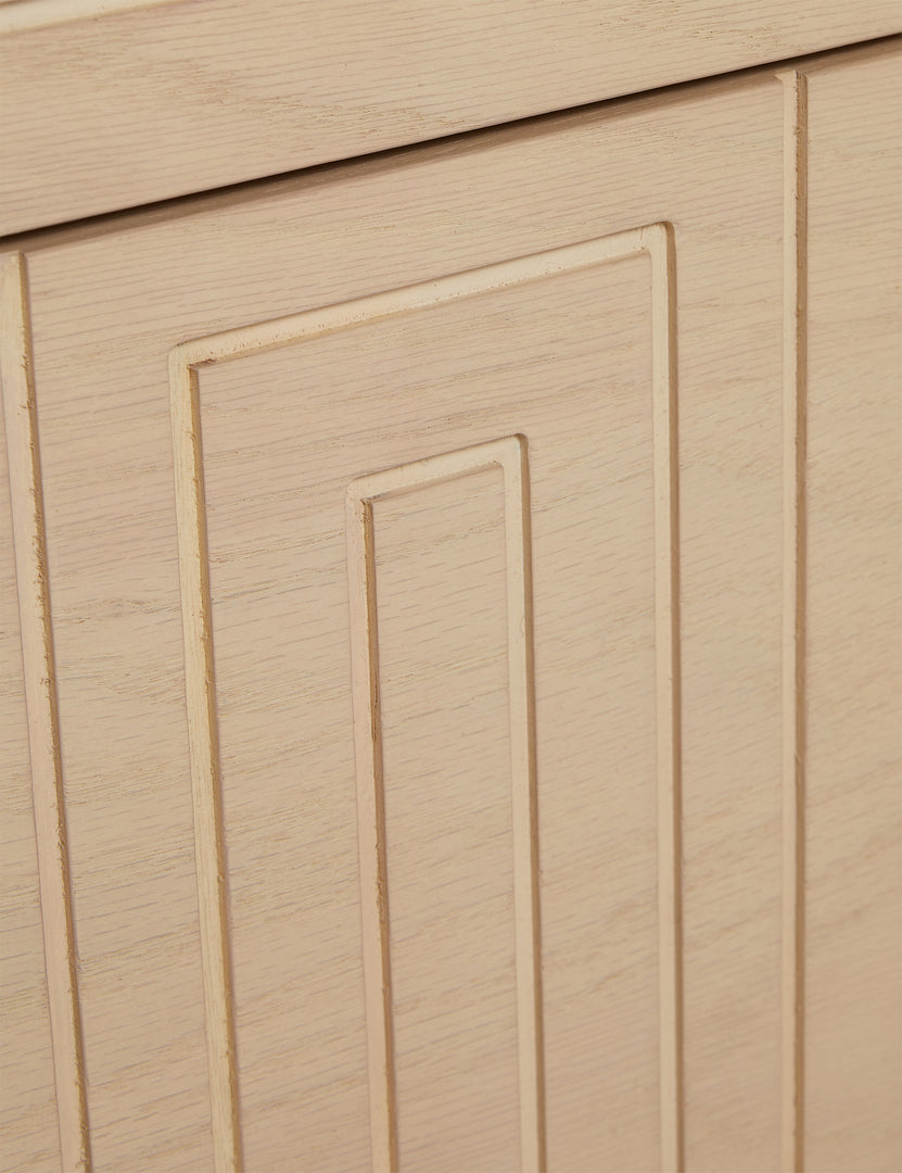 #color::natural-oak | Close up of the Rayner carved linear detailing oak two drawer nightstand.
