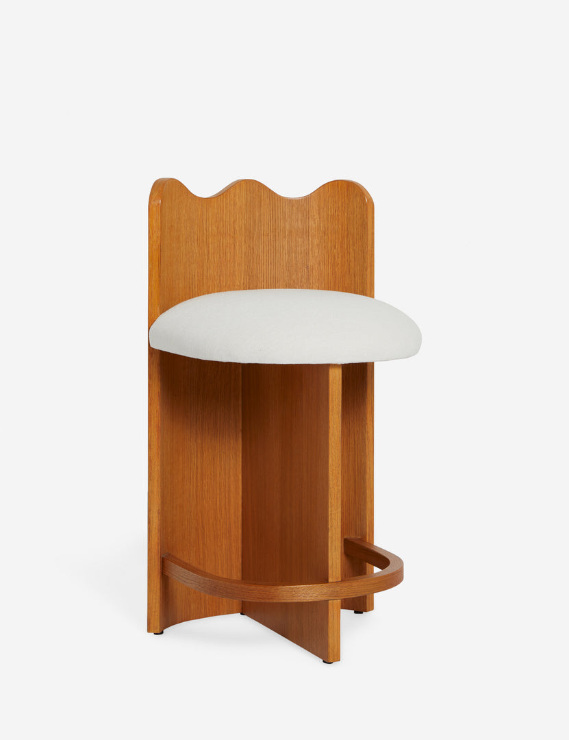#color::honey-oak | Angled view of the Ripple wavy barrel back wooden counter stool