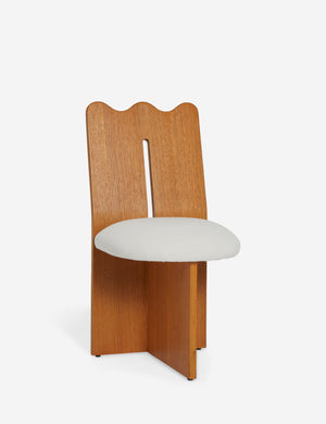 Angled view of the Ripple tall, wavy back wooden dining chair