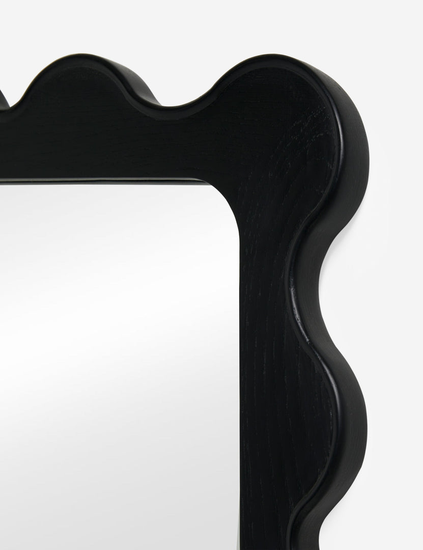 #color::black | Close up view of the  Ripple wavy framed full length mirror in black oak