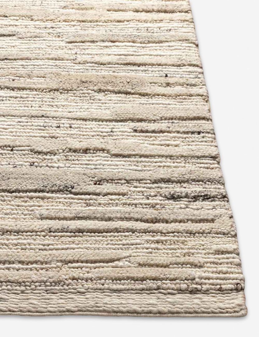 #color::neutral #size::2--x-3- #size::2-6--x-8- #size::5--x-7-6- #size::8--x-10- #size::9--x-12- #size::10--x-14- | Corner of the Rizzoli natural rug