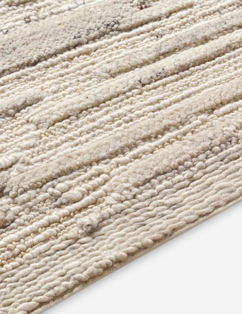 #color::neutral #size::2--x-3- #size::2-6--x-8- #size::5--x-7-6- #size::8--x-10- #size::9--x-12- #size::10--x-14- | Close up of the Rizzoli natural rug