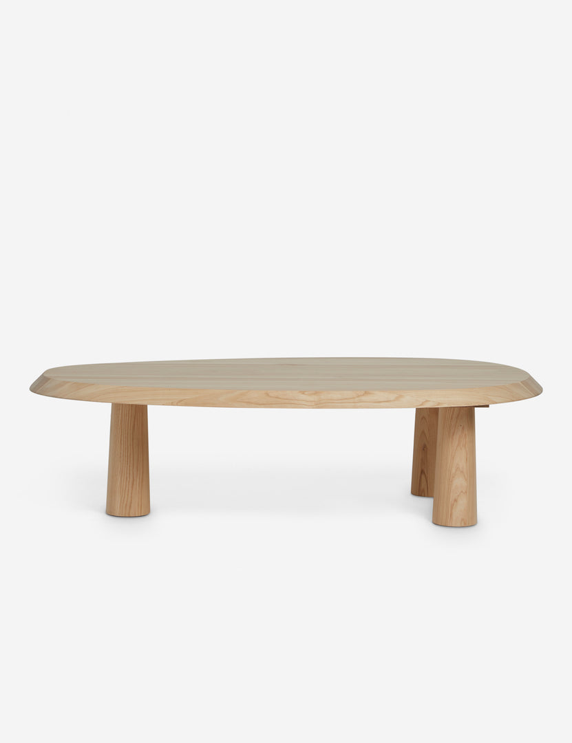 | Side view of Rodolfo organic oval natural wood coffee table