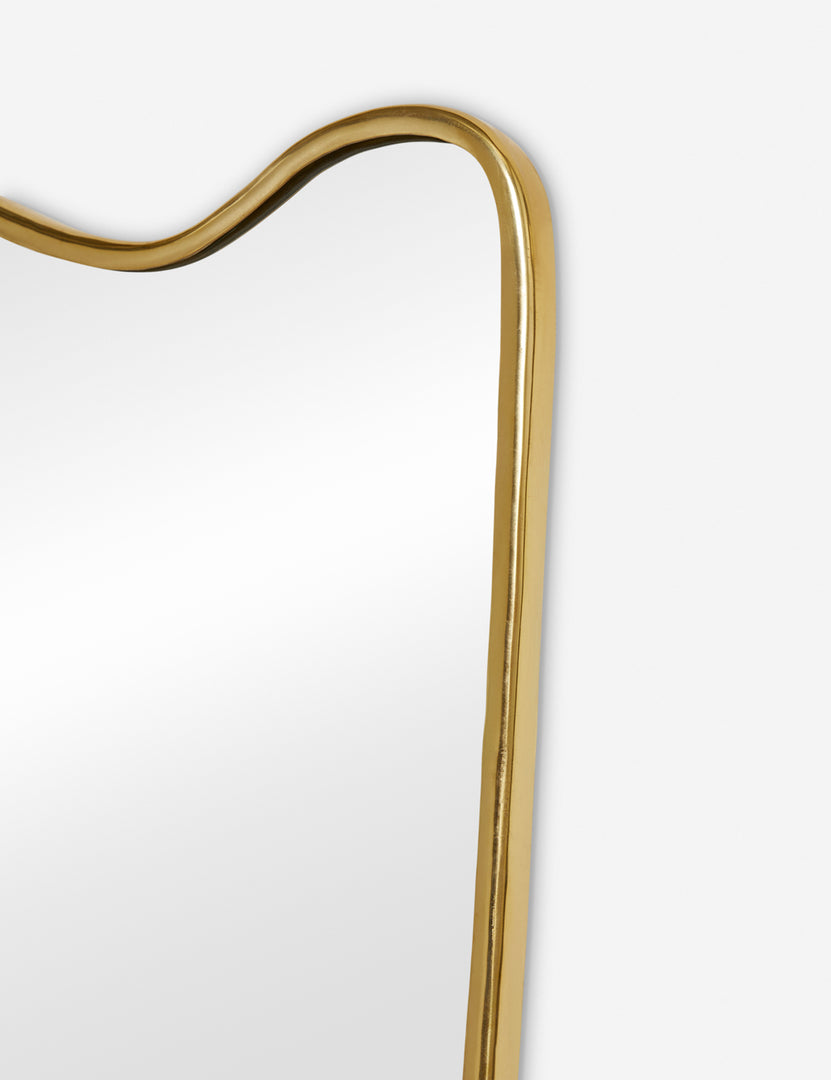#color::gold | The top corner of the Rook golden full length mirror