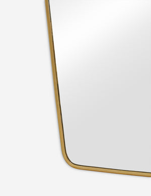 The bottom corner of the Rook golden full length mirror