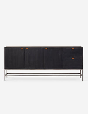 Rosamonde black wood sideboard with brown leather pulls and a metal base
