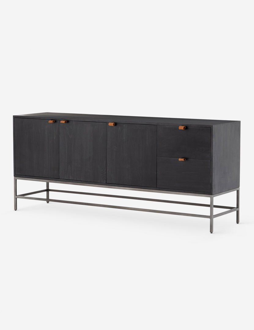 #color::black | Angled right side view of the Rosamonde black wood sideboard with brown leather pulls and a metal base