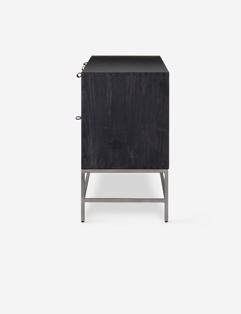 #color::black | Side view of the Rosamonde black wood sideboard with brown leather pulls and a metal base