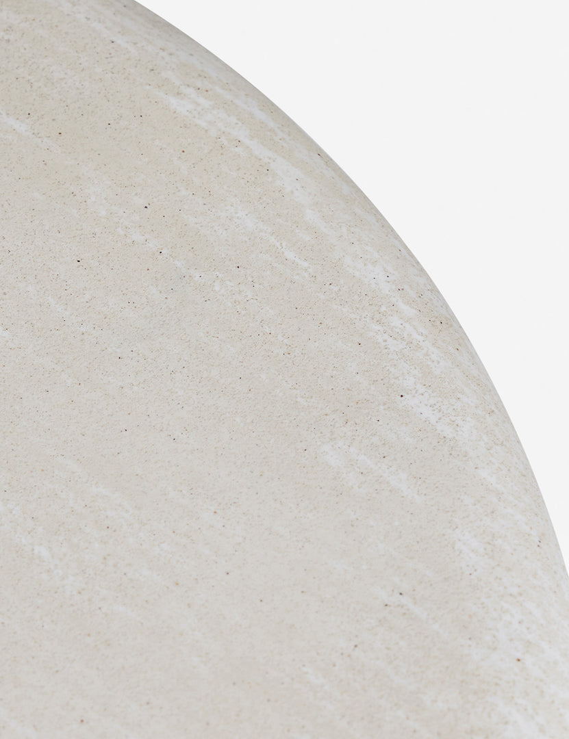 #color::ivory | Close up of the Ruiz round cement outdoor side table.