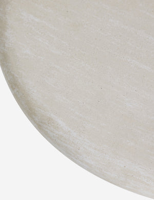 Close up of the Ruiz round cement outdoor side table.