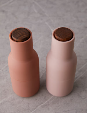 Close up of the Pinkish beige and nude salt and pepper bottle grinders