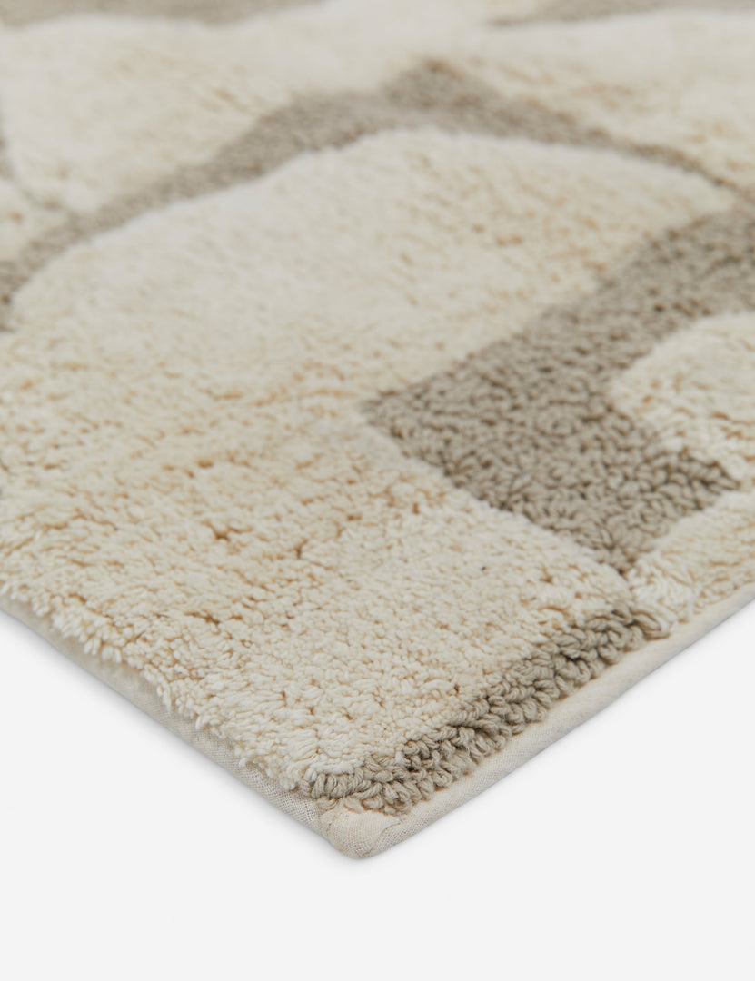 #size::21--x-34- #size::2--x-5- | Close up view of the Sandoval neutral modern bath mat