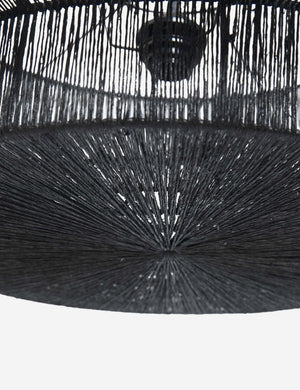 Detailed shot of the black jute on the base of the Sayan black jute-wrapped pendant light