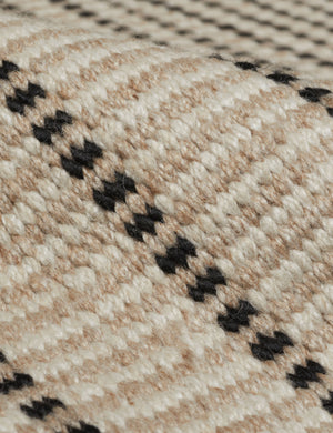 Close up of the Shere handwoven striped outdoor rug by Sarah Sherman Samuel in Natural