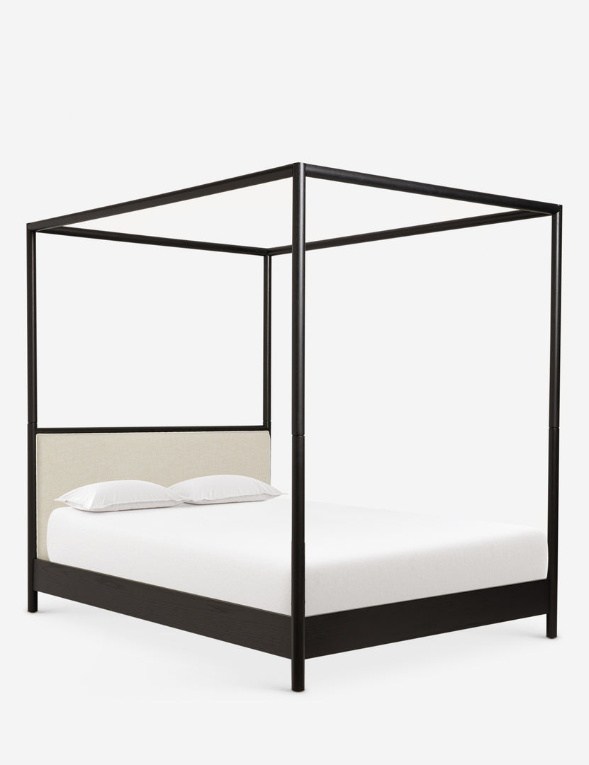 #color::black #size::king #size::queen | Angled view of Simonette black canopy bed with upholstered headboard