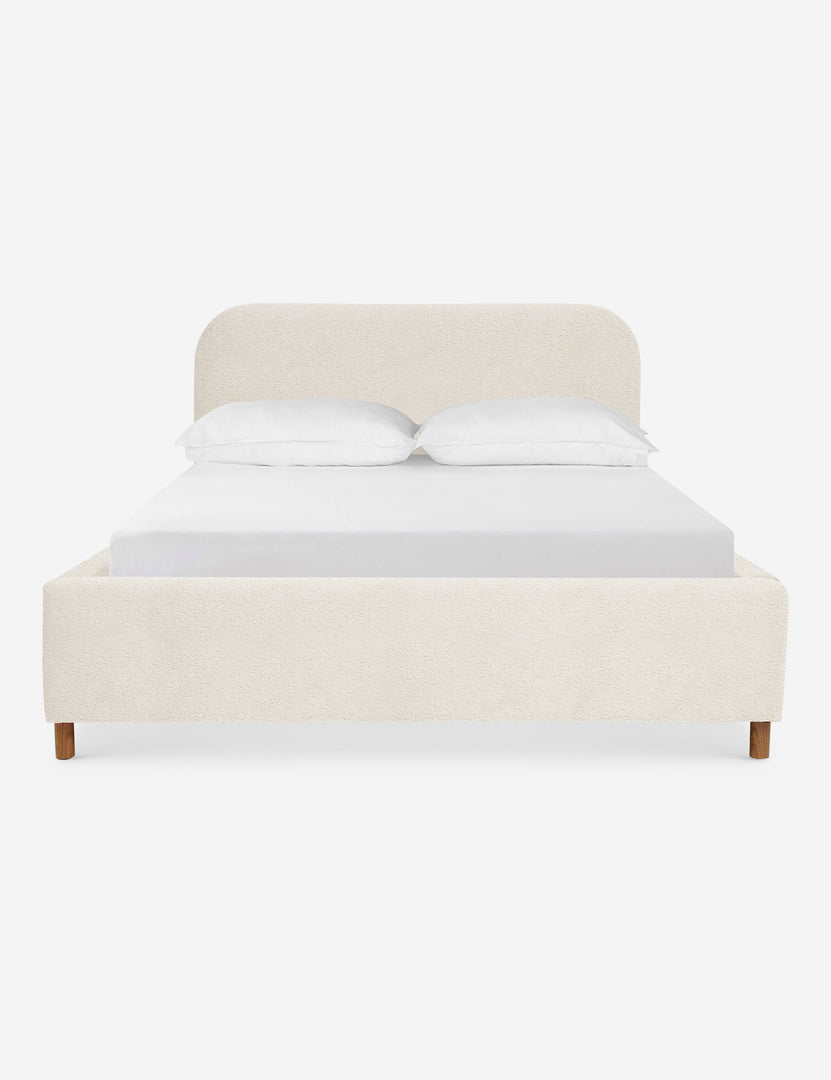 #size::queen #size::king #color::boucle-cream #size::cal-king | Solene Boucle Cream platform bed with an arched headboard and oak wood legs