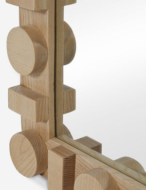 Bottom corner of the Sorenson Floor Mirror in natural.