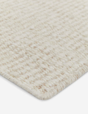 The corner of the Taos ivory rug