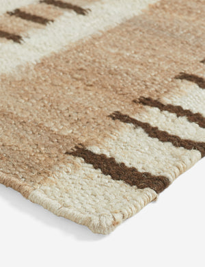 Close up view of the corner of the Tempo Flatweave Jute Rug by Elan Byrd.
