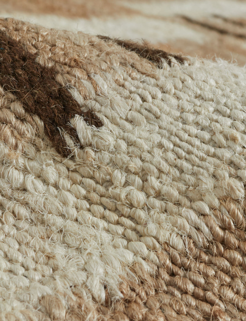 | Close up view of the texture of the Tempo Flatweave Jute Rug by Elan Byrd.