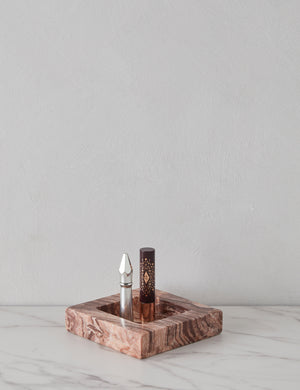 Teo catchall square tray in pink marble holding lipsticks