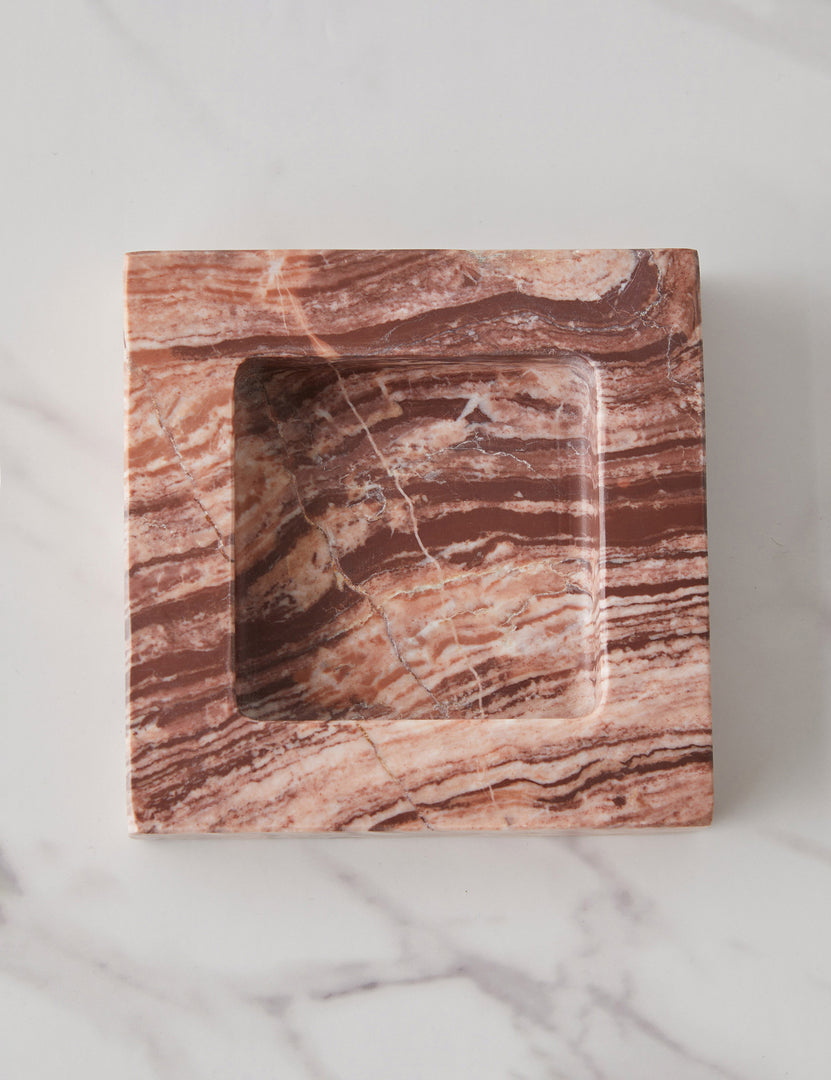 #color::pink-puff-marble | Teo catchall square tray in pink marble holding lipsticks